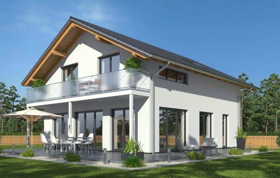 Drevo Fertighaus - Th.Bärtle - Der Hausbau Berater Modernes Einfamilienhaus mit Terrasse und grüner Gartenlandschaft.