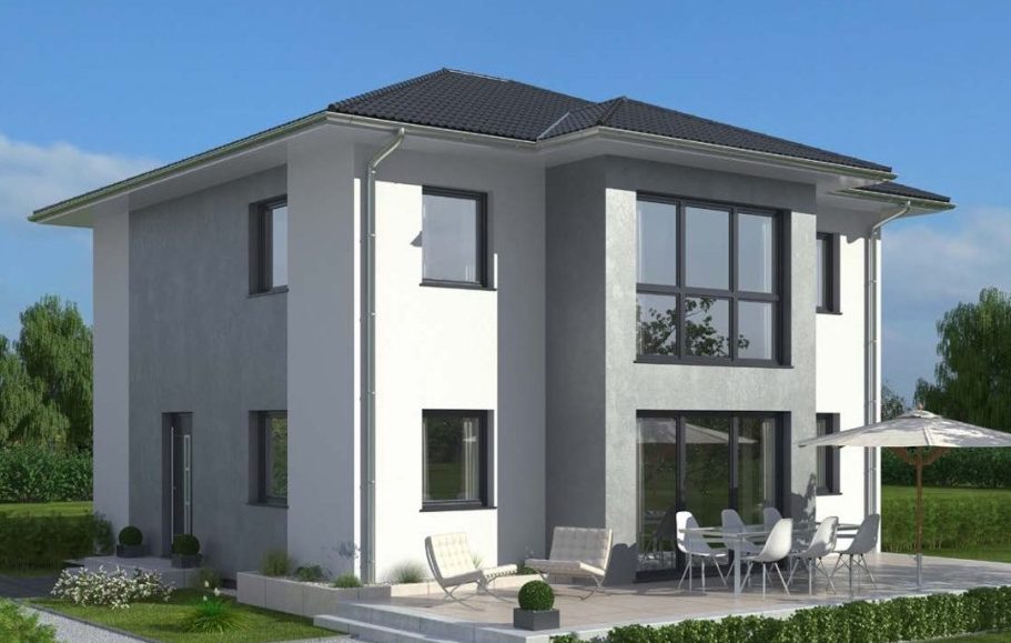 Enovia Haus - Fertighaus Fachberater - Th. Bärtle Modernes zweigeschossiges Haus mit Balkon und großen Fenstern, umgeben von Grünanlagen.