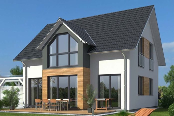 Moderner zweigeschossiger Haus mit großen Fenstern und Holzelementen.